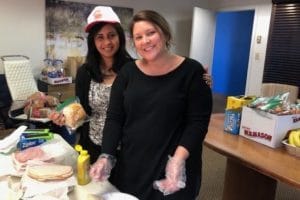 employees making sandwiches for the Support the Soupman organization